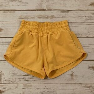 Athleta Girls All Star 2.5” Lined Shorts Orange/Yellow XS/6